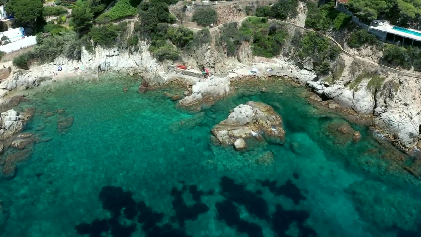 Clear water over pale rock in the eastern cove